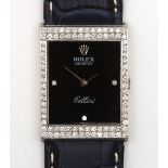 An 18ct white gold and diamond Rolex Cellini mechanical wrist watch c.1975, the rectangular black