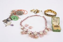 A collection of mixed jewellery to include a 9ct gold ring, coral beads, a Japanese Komai