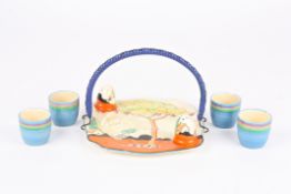 A Clarice Cliff Tulips pattern Bizarre painted egg cruet set comprising four associated egg cups,