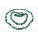 Two very large polished malachite graduated bead necklaces. (2) Approx. length 68 cm.Condition: