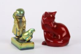 Two pieces of Hungarian Zsolnay pottery comprising a seated red glazed fox, and a green lustre group