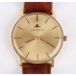 A Jaeger le Coultre 18ct gold mechanical wrist watch the signed gilt dial with baton numerals and in