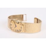 A 9ct gold Bueche Girod mechanical wrist watch with oval bark effect dial and black Roman