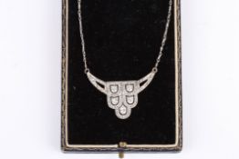 An Art Deco diamond necklace of Odeon design the centre section set with five matched diamonds