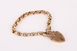 A Victorian fancy link yellow metal bracelet with 9ct gold heart padlock fastening. weight approx.