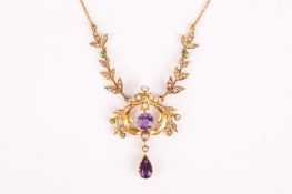 An Edwardian suffragette amethyst and seed pearl pendant necklace set with demantoid garnets, with