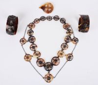 An unusual suite of early Georgian tortoiseshell jewellery comprising of a delicate two row necklace