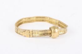 An unusual Victorian articulated strap bracelet with engraved belt hook and fastening detail,