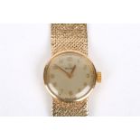 A ladies Omega 9ct gold wrist watch the circular silvered dial signed Omega and with Arabic