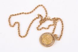 A Victorian 1878 22ct gold full sovereign pendant in a 9ct gold mount with ropetwist chain. 28.5