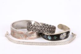 Three silver bracelets and another silver plated bracelet with mother of pearl inlay. (4) Silver: