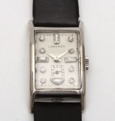 A 1940s Art Deco Longines platinum mechanical wrist watch c.1943/44 the rectangular silvered dial