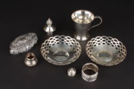 A collection of silver items including two pierced dishes, a silver cup, a repoussé box and cover