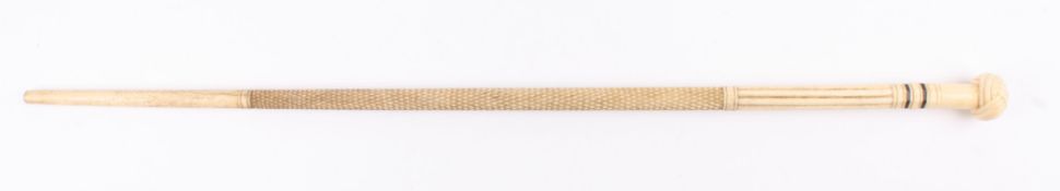 A 19th century marine ivory and whale bone walking stick the ivory handle carved as a Turks head