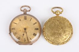 A Victorian yellow metal open face pocket watch with gilt metal dial and black Roman numerals,