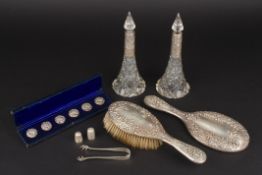 A collection of assorted silver items including a pair of silver mounted scent bottles, together