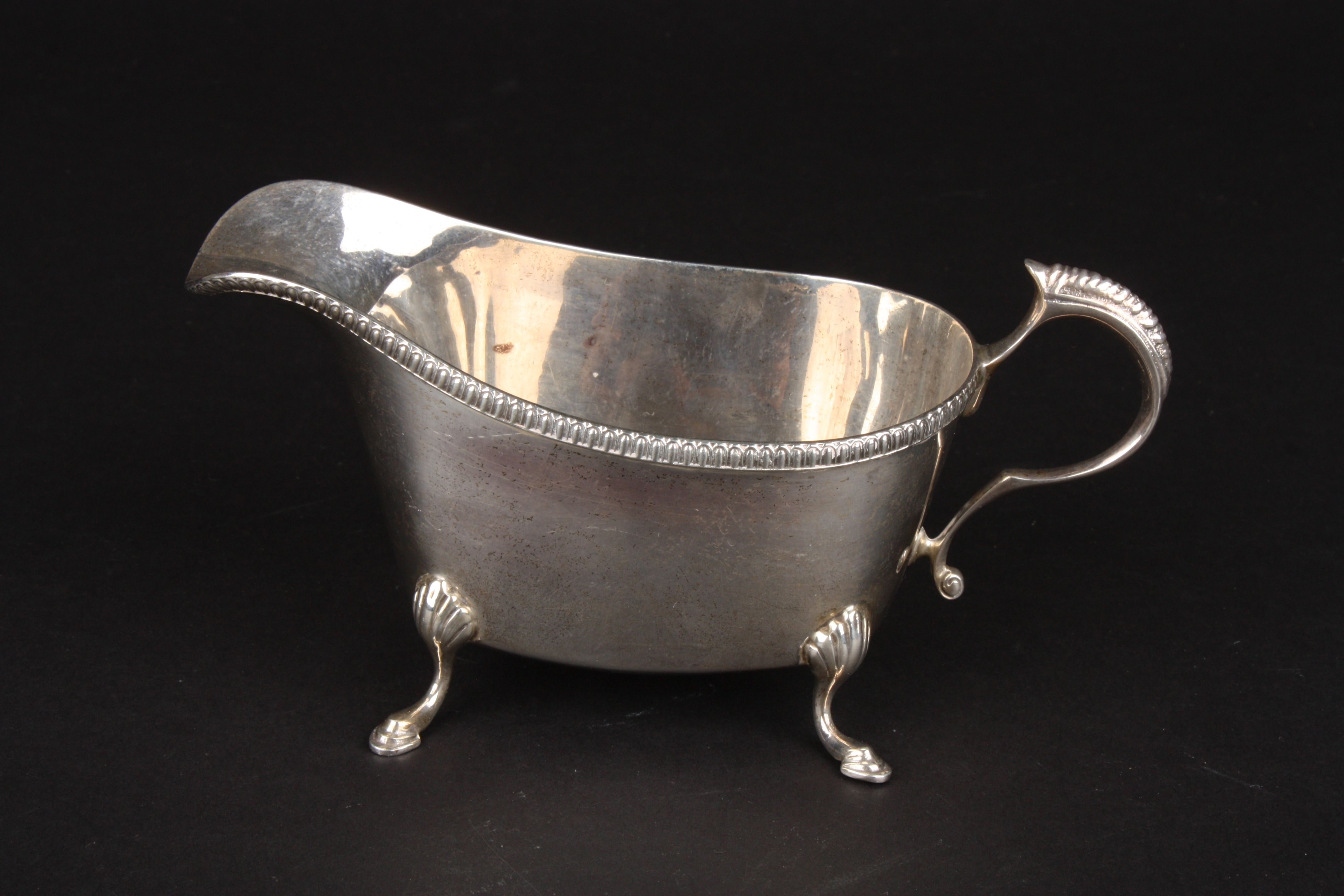 Two canteens of silver cutlery in mahogany canteens together with a silver sauce boat, hallmarked - Image 2 of 2