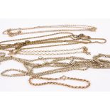 A Victorian 9ct. gold long guard chain, another gold chain, a 9ct gold rope twist bracelet and two