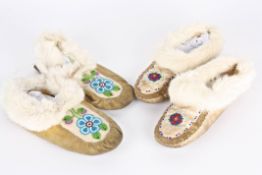 A pair of mid 20th century native America floral beaded moccasins with fur trim, probably Yukon,