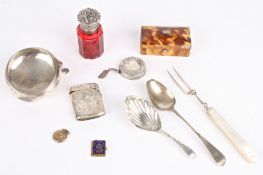 A small group of objets d'art comprising a George III silver caddy spoon hallmarked London 1786, a