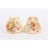 Two Royal Worcester blush ivory vases, one with two small scrolled handles, both decorated with