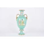 A large Victorian pottery Grecian style urn decorated with Grecian figures and a chariot, with