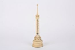 A late 19th century Continental carved ivory desk thermometer in the form of a minaret, with