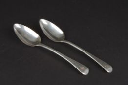 A pair of Georgian silver table spoons hallmarked London 1811, makers mark: William Eley, William