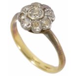 A late Edwardian circular diamond set cluster ring, 18ct gold and platinum mount size LCondition:
