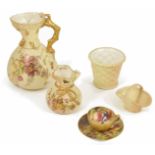A small collection of Worcester including a miniature cup and saucer together with four pieces of