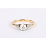 A single stone diamond set solitaire ring in 18ct gold and platinum mount Approx. 0.75ct. Size