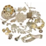A small collection of silver jewellery to include a large Chinese silver and enamel brooch, a pair