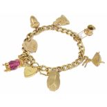 A 9ct gold curb link charm bracelet with heart padlock fastening hung with various gold charms