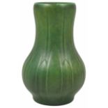 A Pilkingtons Royal Lancastrian crackle green glazed vase moulded with stylised leaf design, impress