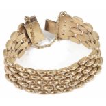 A fully articulated 9ct gold bar link bracelet some additional loose links, integral push