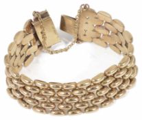 A fully articulated 9ct gold bar link bracelet some additional loose links, integral push