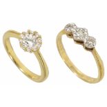 A delicate contemporary diamond 'daisy' cluster ring of good quality, the centre stone approx. 0.
