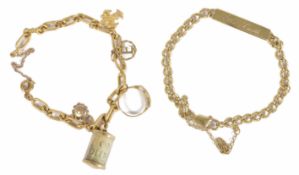 A fancy link yellow metal charm bracelet marks rubbed .750 with a mixture of 18 and 9ct charms