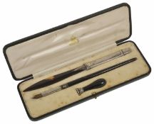 An Asprey tortoiseshell and silver pen set hallmarked London 1916 with envelope opener, seal and