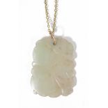 A mutton fat jade pendant carved and pierced, on gold plated chain 4.6 x 3.3cmCondition: In good