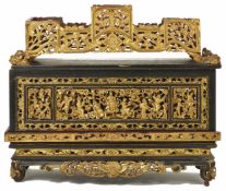 A 19th century Chinese carved gilt and lacquered sectioned display stand/ancestar box the front well