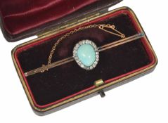 A good quality Edwardian turquoise and diamond brooch having central tear shaped turquoise of even