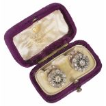 A pair of 19th century rose diamond set circular cluster earrings earrings having rose diamond set