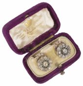 A pair of 19th century rose diamond set circular cluster earrings earrings having rose diamond set