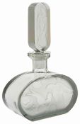 A French Art Deco pale grey glass scent bottle with embossed stylised birds flying