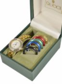 A vintage Gucci dress watch with interchangeable coloured dial trims, original fitted Gucci box