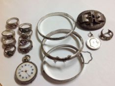 A small collection of Victorian and later silver jewellery including a ladies silver cased French