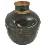 A Martin Brothers pottery vase of organic form in mottled green/blue glaze, the vase marked 1-85