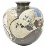An unusual Japanese earthenware vase of globular form decorated with Art Noveau style, with shaped