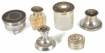 A small collection of tortoiseshell and silverware comprising a silver trinket box with